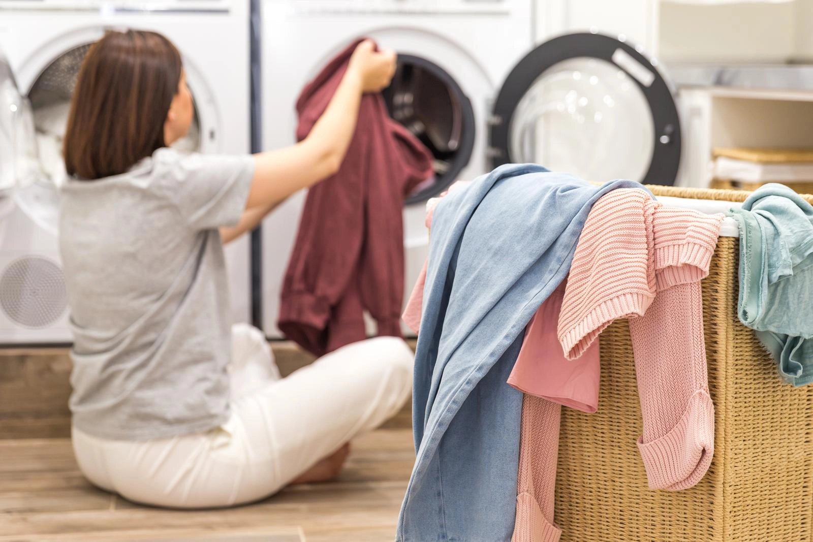 Professional washer dryer repair service being carried out by a skilled engineer.