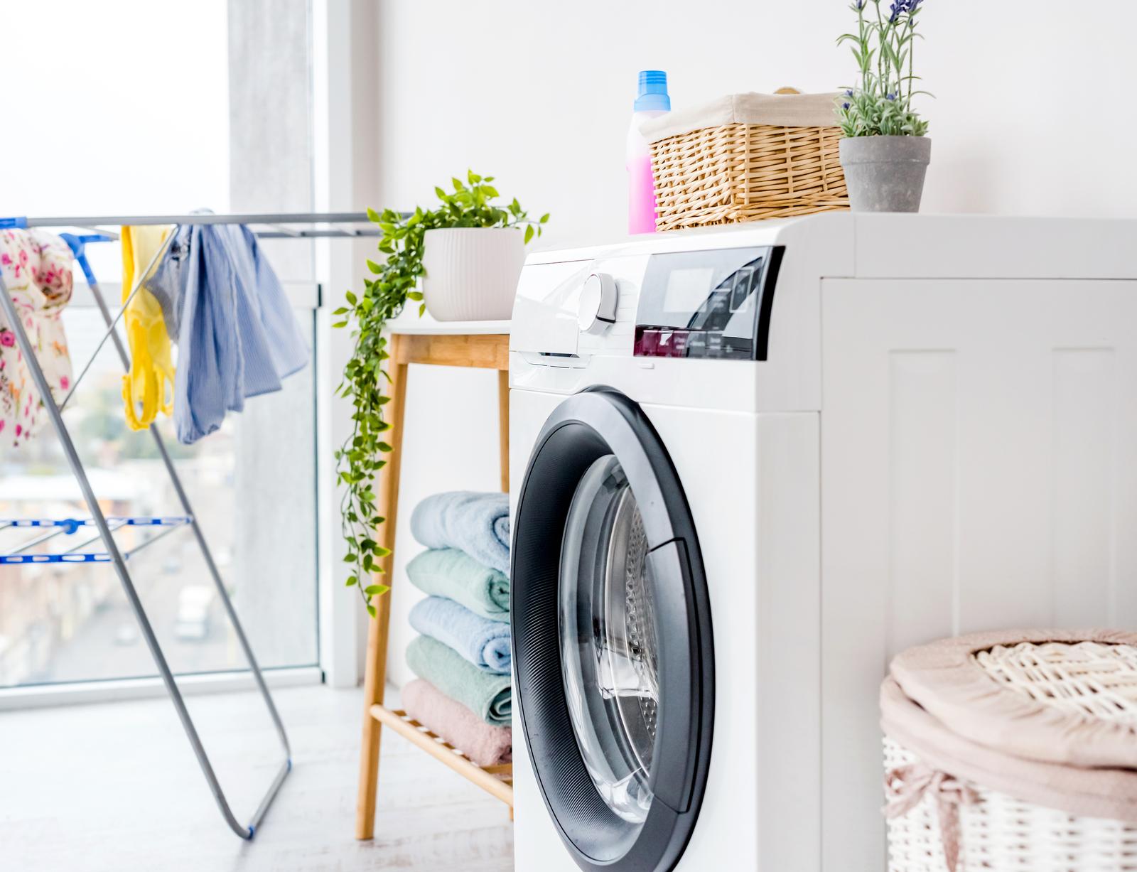 Washing Machine Repair Standish - Professional Appliance Services - Appliance Repair Men - Appliance Repair Men Professional washing machine repair Standish engineer fixing a laundry appliance in a residential bathroom.