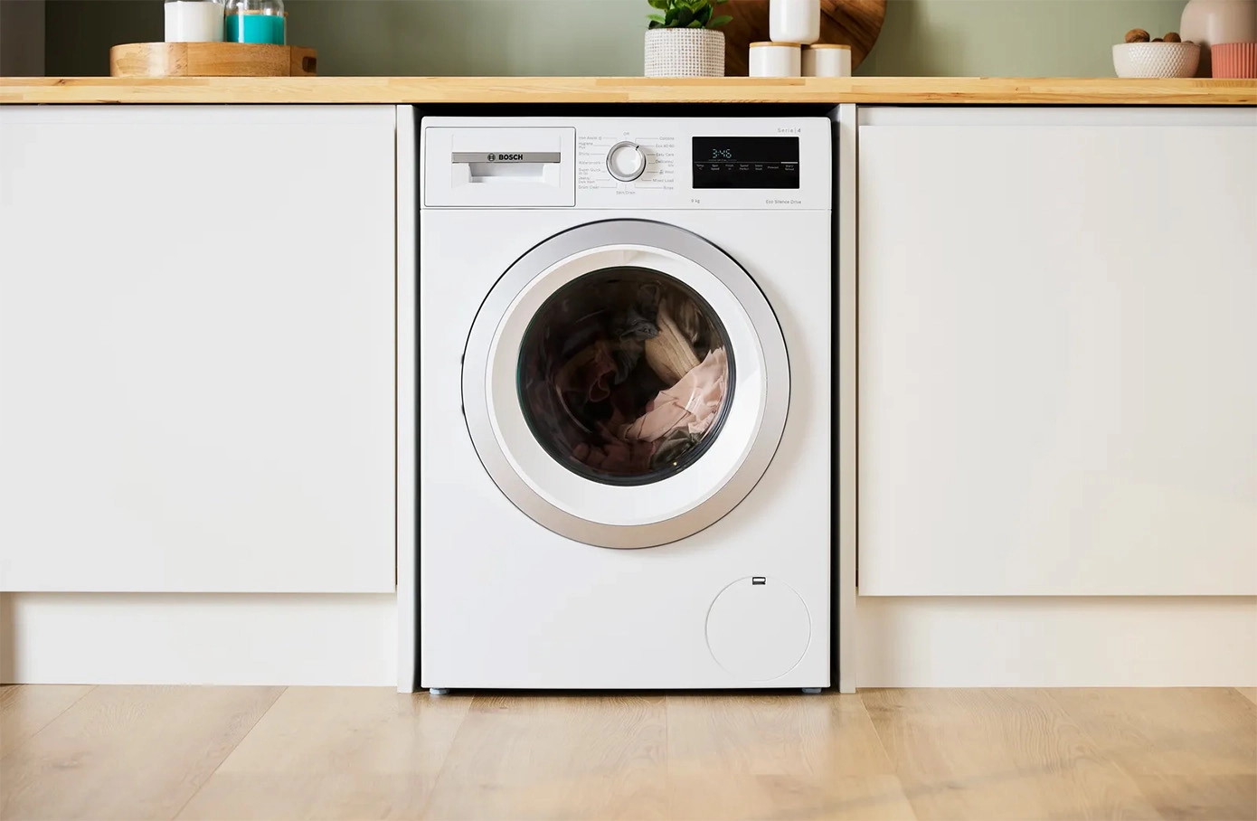 An expert review showing how Bosch appliances rank for energy efficiency, reliability, and innovative features in a modern UK kitchen setting.