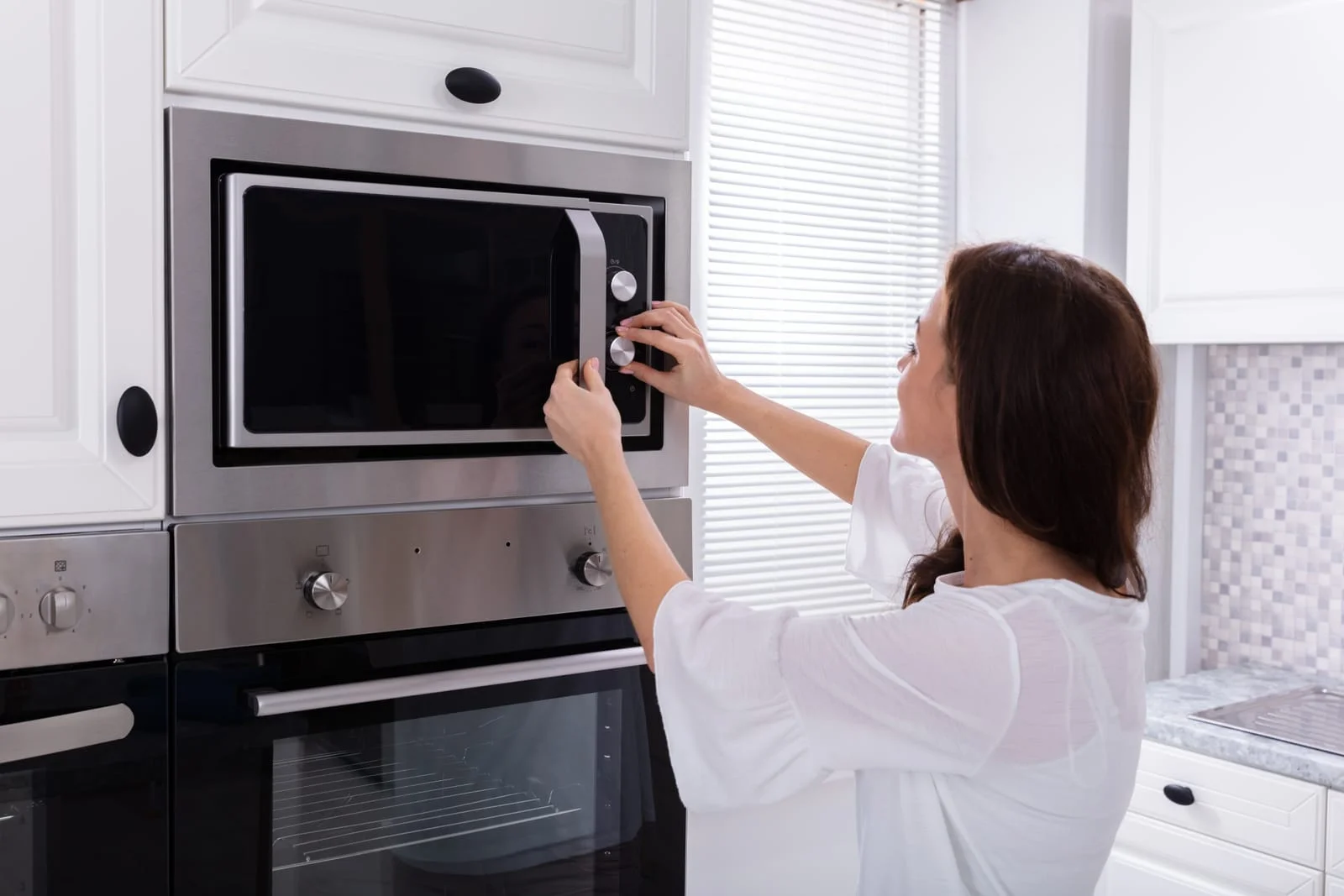 A professional engineer inspecting an Electric Oven Not Heating to determine if it requires an Oven Element Repair